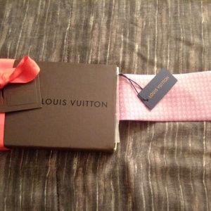Louis Vuitton tie.